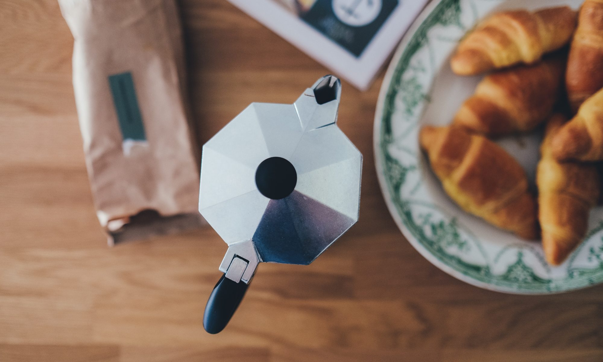 Coffee pot and croissants